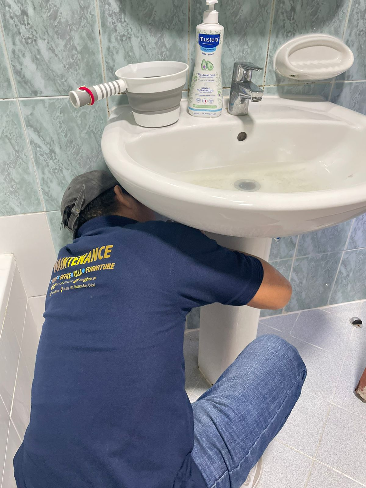 Fixing a leaking pedestal wash basin and tightening plumbing connections