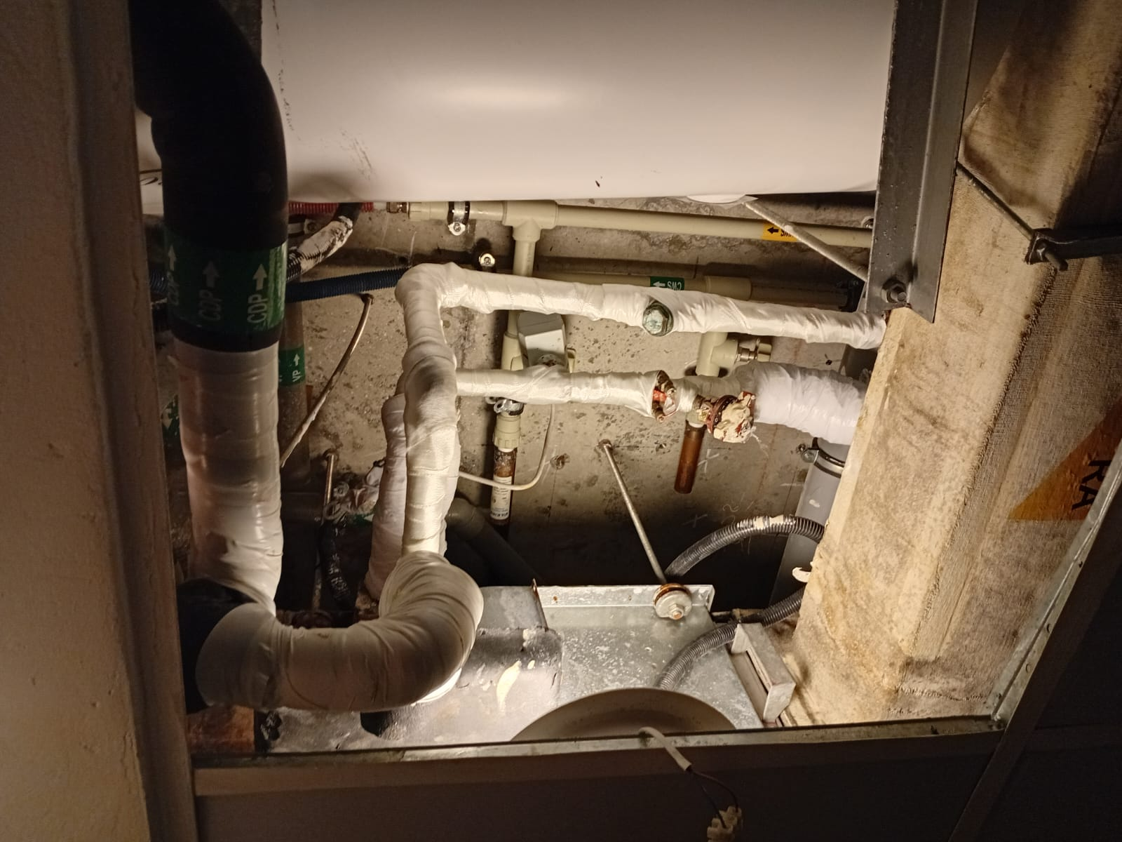 Chilled-water pipework and drain lines inspected in the ceiling service void