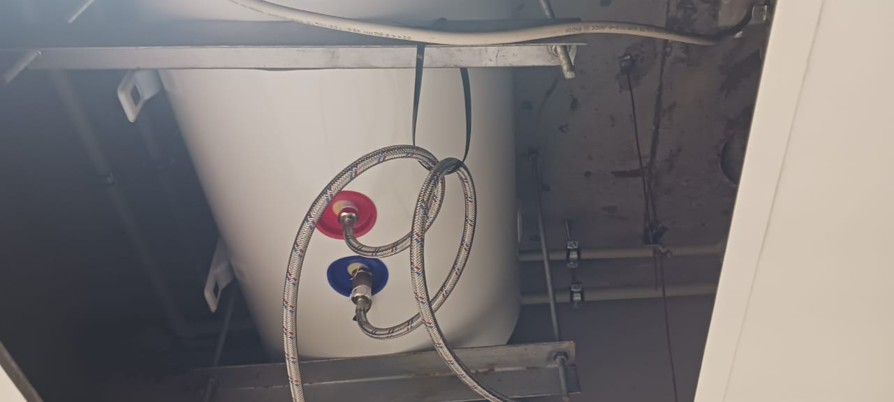 New heater mounted neatly with braided hot and cold lines