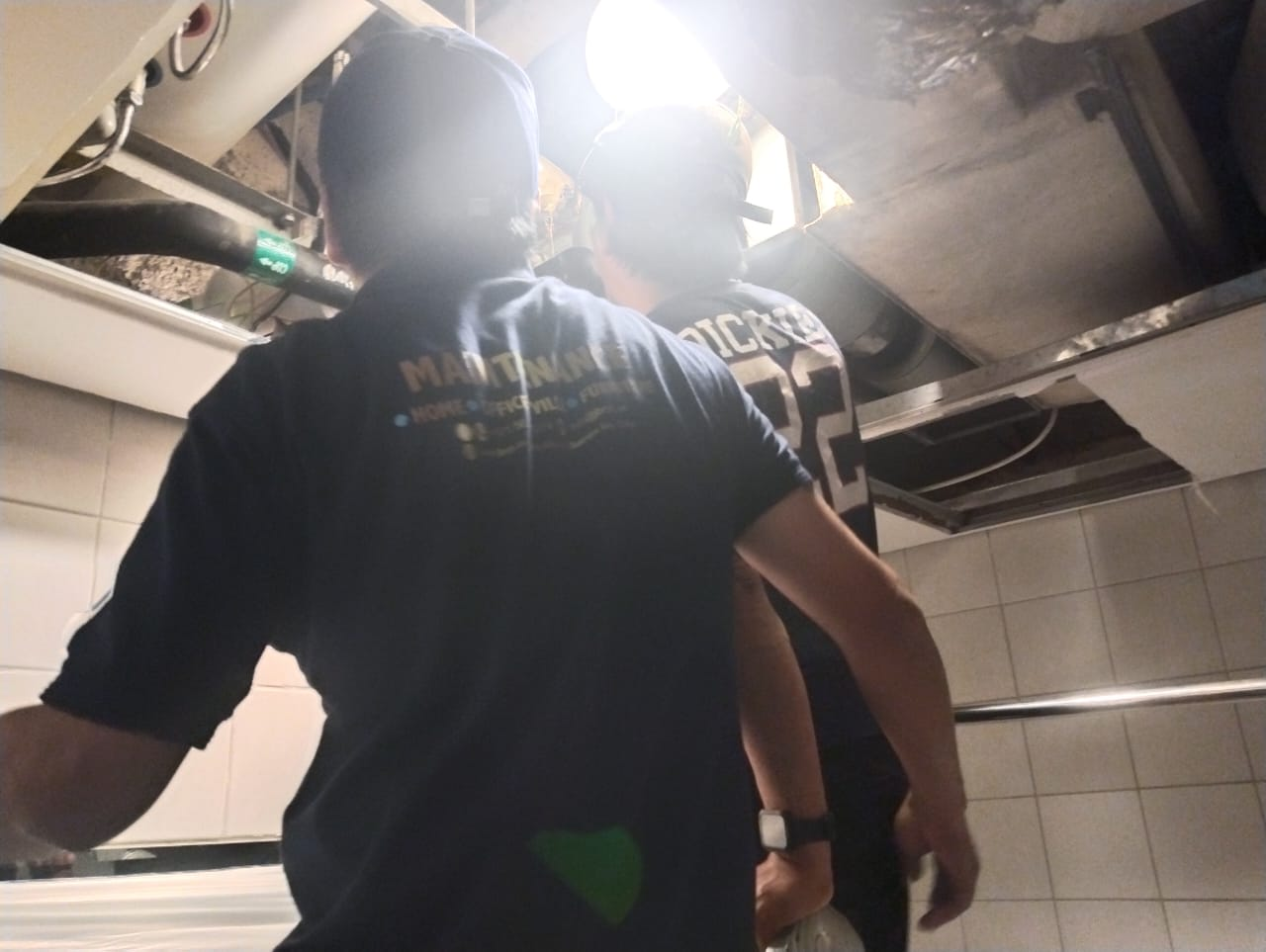 Team finishing the replacement inside the service opening