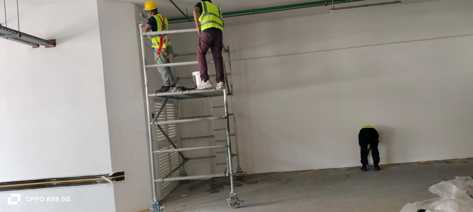 Final wall coats with harness & scaffold safety