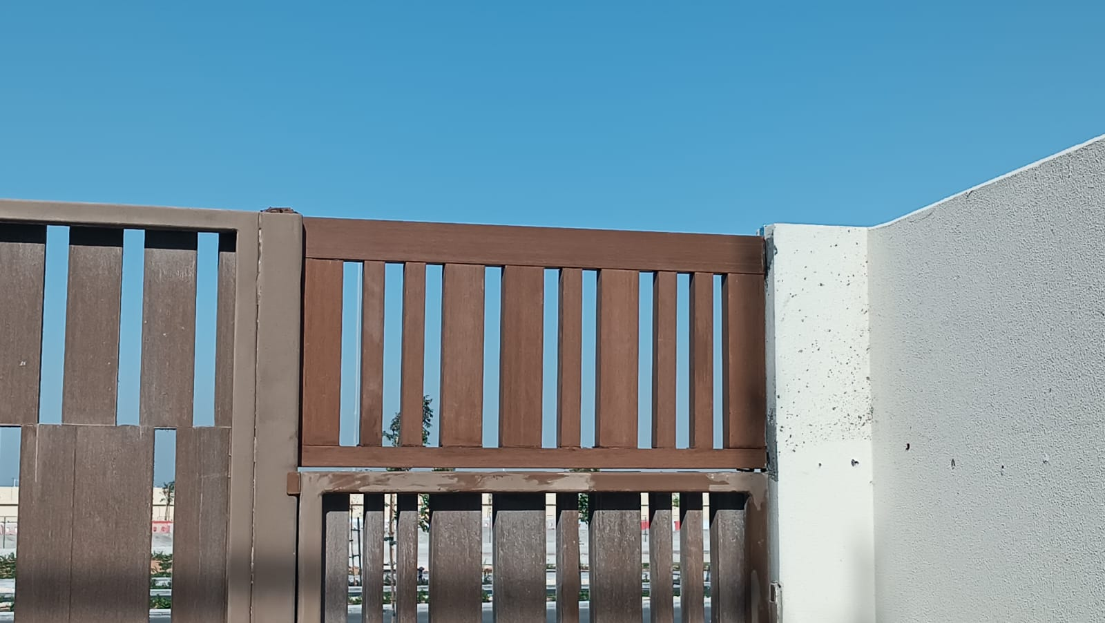 Close-up of restained slats with clean brown wood finish